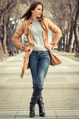 young woman in jeans and shirt