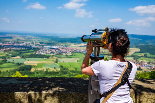 Woman tourist on the observation deck, viewing platform Hohenzollern Castle, Germany