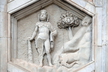Hercules and Cacus from the workshop of Andrea Pisano, Relief on Giotto Campanile of Cattedrale di Santa Maria del Fiore (Cathedral of Saint Mary of the Flower), Florence, Italy