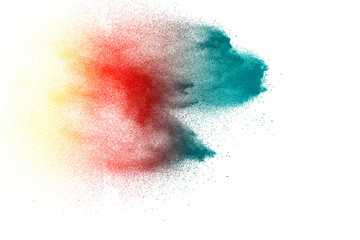 Multicolored powder explosion on white background.