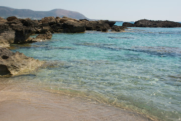 Falasarna beach, Crete Island landmark. Paradise beach with turquoise water and pink sand, Greece