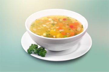 Bowl of delicious vegetables soup on  table