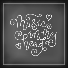 Modern calligraphy lettering of Music in my head in white on chalkboard with frame background for decoration, poster, banner, music festival, show, cover, music shop, advertising, concert, theater