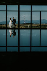 Wedding couple with reflections