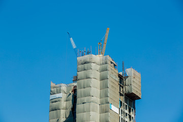 Building crane and buildings under construction