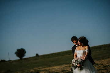 Wedding couple in the field