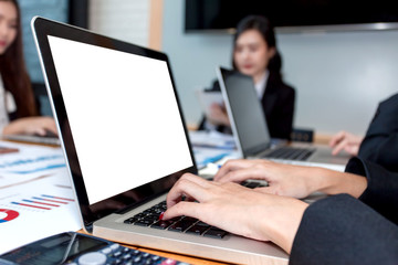 Business woman using a computer laptop at meeting.