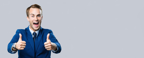 businessman with thumbs up gesture
