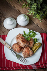 Meatball with parsley.