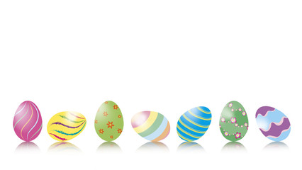 Liegende und stehende pastellfarbige Ostereier