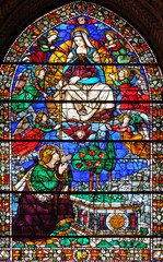 Madonna giving her girdle to Saint Thomas, stained glass window in Santa Maria Novella Principal...