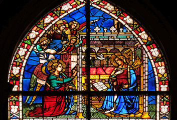 Annunciation to the Virgin Mary stained glass window in Santa Maria Novella Principal Dominican church in Florence, Italy