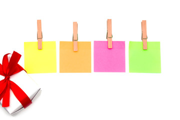 Wooden clips,Clothespin Sticky notes and White gift box isolate on white background concepts
