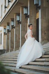 bride in white dress in the city