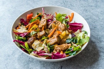 Fresh Salad with Cubed Meat Pieces in Bowl.