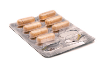 Used aluminum blister pack with medicine herbal pills.