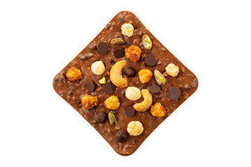 Milk chocolate bar with hazelnuts, pistachio and cashew isolated on white background