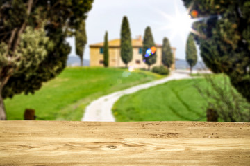 Desk of free space and Tuscany landscape 