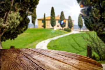 Desk of free space and Tuscany landscape 