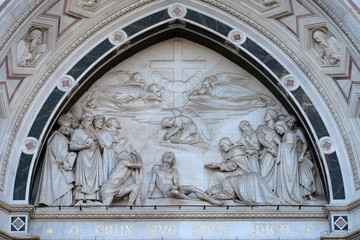 Obraz premium Sculpted lunette containing a relief of the Triumph of the Cross, by Giovanni Dupre, over the central door of the of Basilica of Santa Croce in Florence, Italy