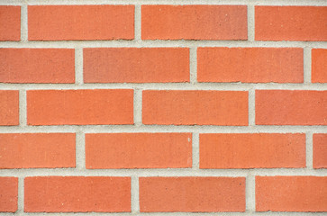New red brick wall texture background with grey grout filling