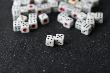 game dice on a black background -