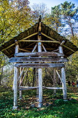 wooden gazebo in the forest    