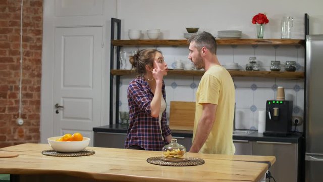 Caucasian couple very emotionally quarreling