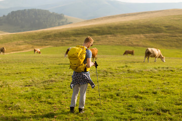 Naklejka premium Handsome young red hair man hiking