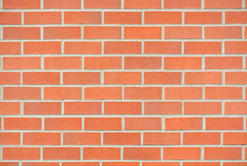 New red brick wall texture background with grey grout filling