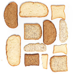 Set of several slices of different bread on a white background.