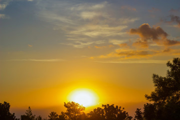 Golden Horizons: Tranquil Sunset Casting Warm Hues Over Cyprus Peaks
