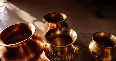 Brass lota of different shape and sizes.
