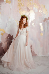 Elegant red-haired girl bride. Young beautiful woman in wedding dress