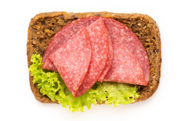 Sandwich with salami sausage on white background.