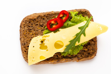 Sandwich with lettuce, cheese on white background.