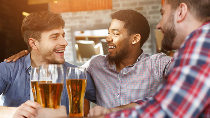 Best friends meeting and chatting in bar