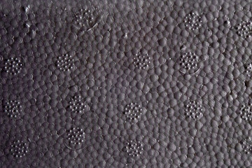 Gray foam texture, background close-up.