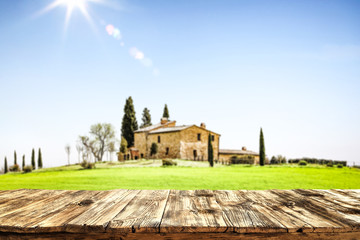 Fototapeta premium desk of free space and tuscany landscape 