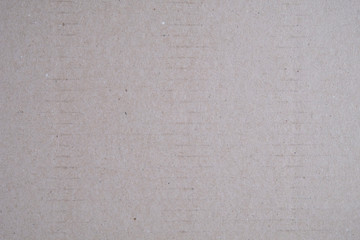 Texture of cardboard gray color, closeup background.