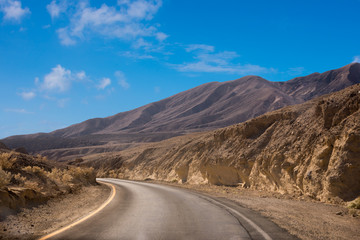 Scenic road in the desert of Death valley national park, USA