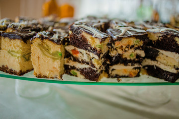 The bright cupcakes are laid out on the trays