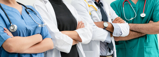 Healthcare people group. Professional doctor working in hospital office or clinic with other...