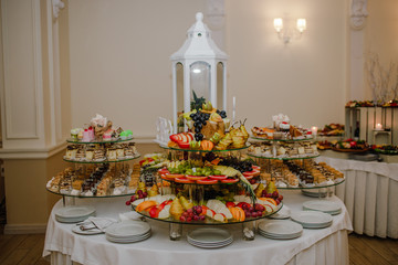 Sweet cupcakes are laid out on the trays