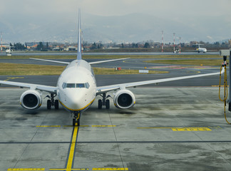 Fototapeta na wymiar Airport boarding passengers on the aircraft.