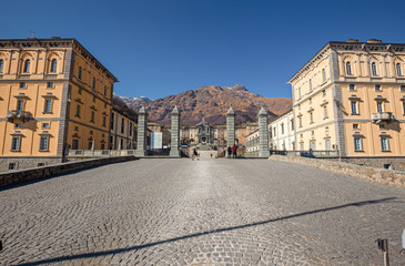 Fototapeta na wymiar Panoramic view of the inner courtyard of the seventeenth-century monumental complex dedicated to the Virgin Mary, of the Sanctuary of Oropa in Piedmont, Italy.