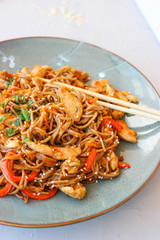 Buckwheat noodles with vegetables and chicken breast in the sauce teriyaki