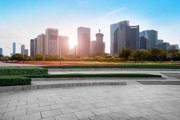 Urban skyscrapers with empty square floor tiles