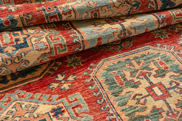 Close up of a very fine hand knotted Caucasian Kazak rug