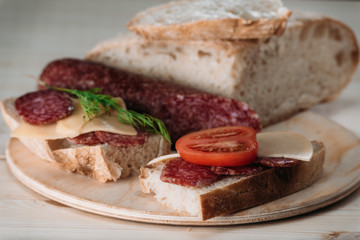 Sandwiches with salami and cheese